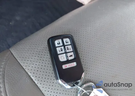 2018 Honda Odyssey Elite z USA, uszkodzony, nr VIN 5FNRL6H95JB014662